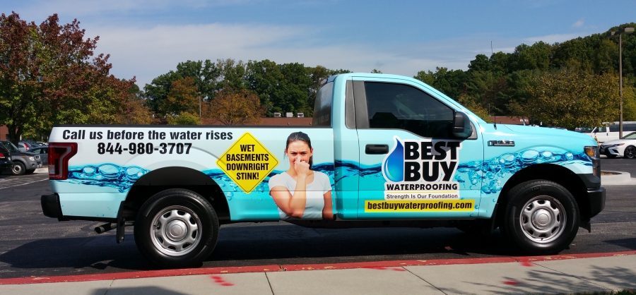Best Buy Waterproofing branded pick-up truck