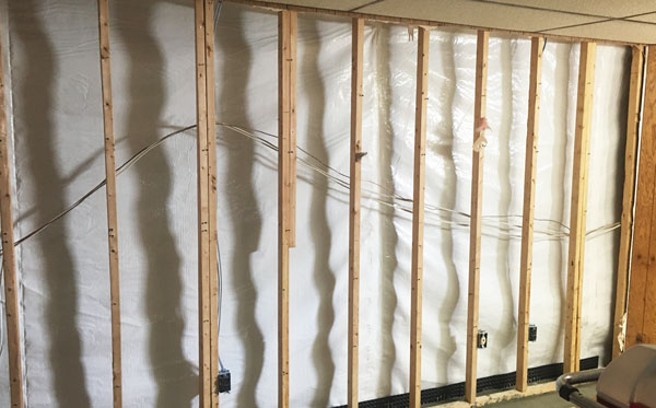 Frame for a wall in a basement