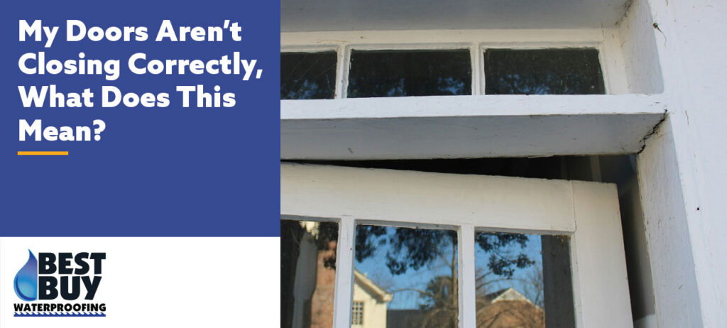 Misaligned door frame with a door that won’t close properly, indicating possible foundation settlement or structural shifting.