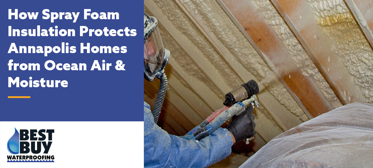 Technician applying spray foam insulation to the underside of a home's roof deck in Annapolis, MD, creating an air seal that helps block moisture and improve energy efficiency.